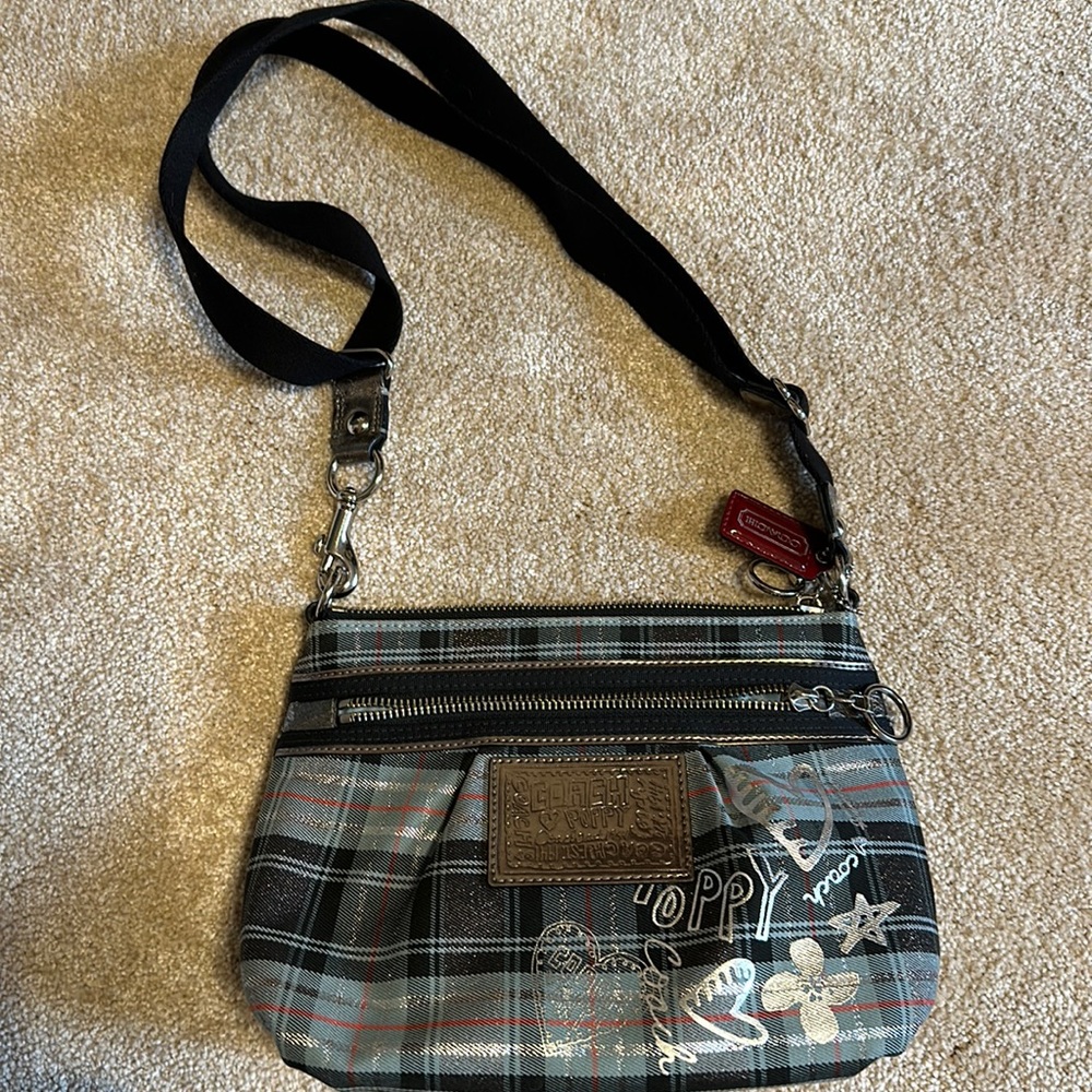Lightly used Coach Poppy small crossbody bag.